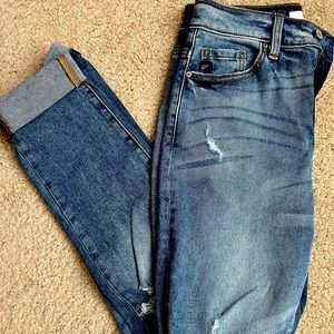 Never worn KanKan jeans. New without tags, distressed look